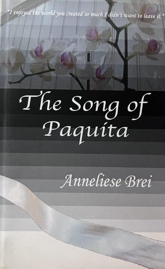 This is the cover of the book The Song of Paquita. The central image is a cherry blossom branch. This image links to a amazon.com page.